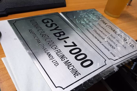 ผลงานป้ายสแตนเลสกัดกรด