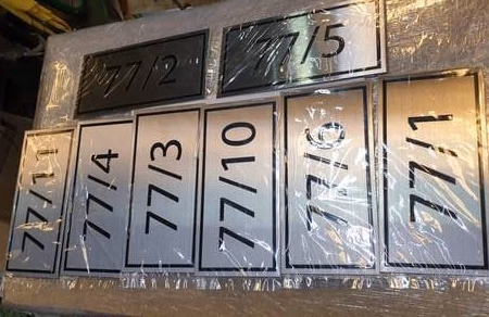 ผลงานป้ายสแตนเลสกัดกรด