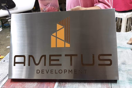 ผลงานป้ายสแตนเลสกัดกรด