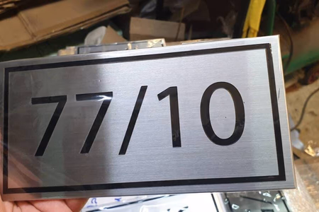 ผลงานป้ายสแตนเลสกัดกรด